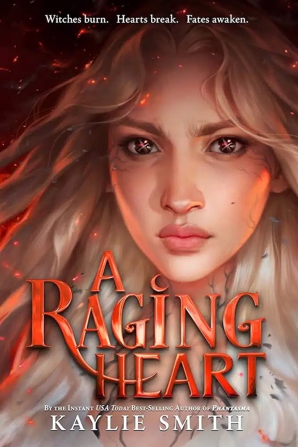 A young woman with long, flowing blonde hair and intense eyes stares forward, surrounded by glowing embers. The text reads: A Raging Heart by Kaylie Smith—perfect for summer reads or slipping into your beach tote. Witches burn. Hearts break. Fates awaken.