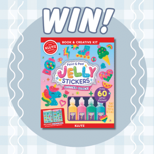 A colorful “WIN!” graphic features a Klutz Paint & Peel Jelly Stickers Glitter Goals craft kit, which includes paint bottles and sticker designs of rainbows, unicorns, and treats on a light blue checkered background.