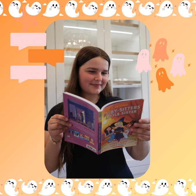 A girl with long brown hair and a black shirt smiles while reading Karens Ghost from the Bestie Book Club. The photo has a border decorated with cute ghosts and speech bubbles on an orange background.