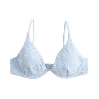 Light blue bra with thin straps, underwire cups, and white embroidered floral patterns scattered across the fabric—perfect for summer outfits inspired by The Summer I Turned Pretty. Features a front clasp and a soft, feminine design.